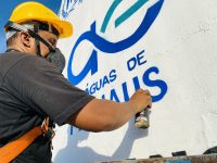 grafite-no-reservatorio-de-agua-do-nucleo-23-destaca-a-integracao-de-refugiados-em-manaus